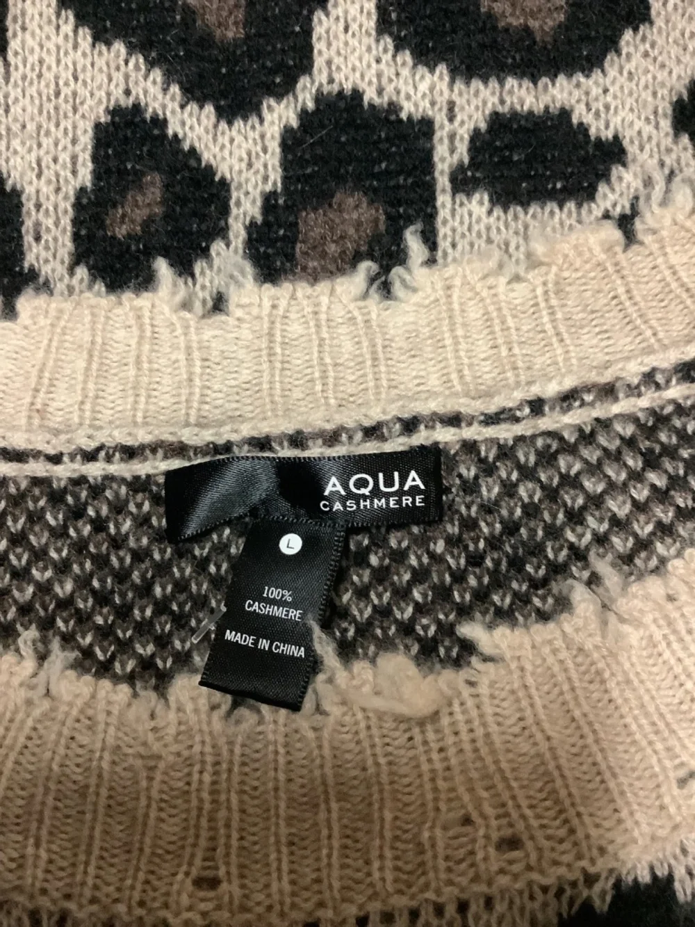 Aqua Cashmere designer name